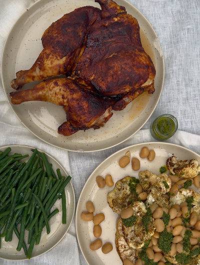 BBQ Spatchcock Chicken with Roasted Cauliflower, Butter Beans + Salsa Verde